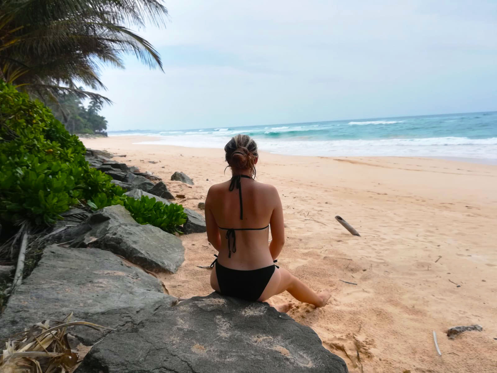 Woman Sitting On the Beach